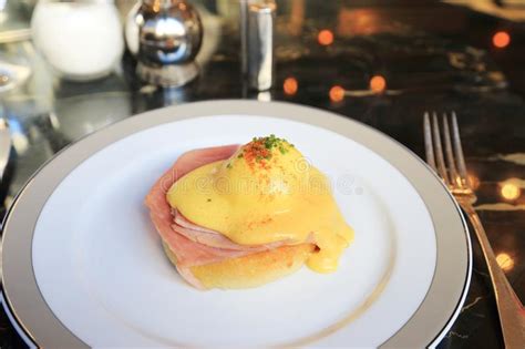 Egg Benedict With Ham On White Dish English Breakfast Stock Image