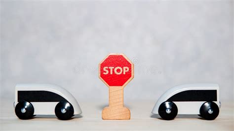 Miniature Car Toy with Mini Stop Sign on the Table Stock Photo - Image ...