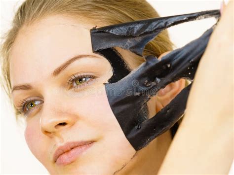 Girl Removes Black Mask From Face Stock Photo Image Of Carbon Face