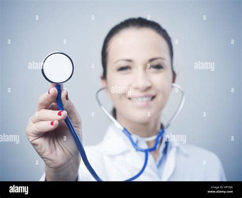 Female Smiling Doctor With Stethoscope Heart Diseases Prevention