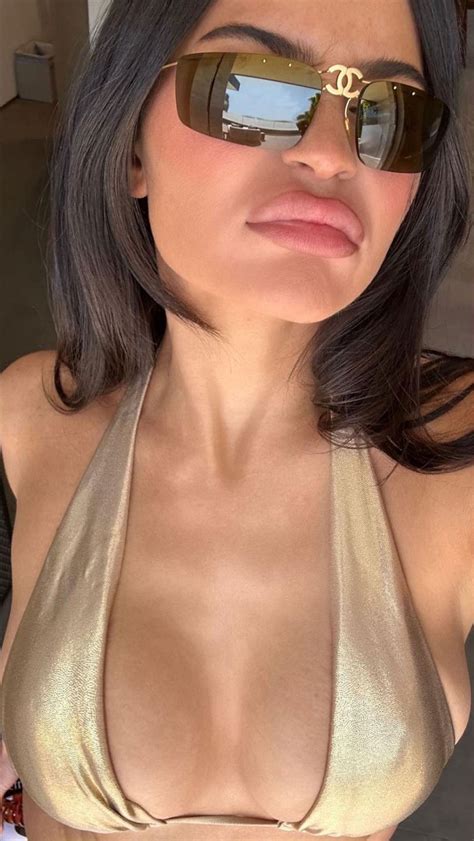 Kylie Jenner Shows Off Ample Cleavage In A Plunging Bikini In Sexy New