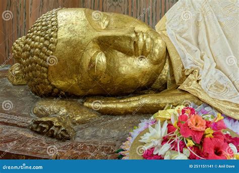 Golden Head of Reclining Buddha Statue on the Side of Parinirvana Temple in Kushinagar ...