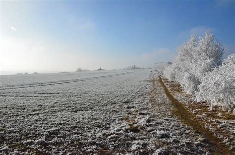 Bildet Landskap Hav Tre Natur Fjell Sn Kald Himmel Sol