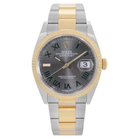 Rolex Datejust Yellow Gold And Steel Palm Motif Dial Jubilee