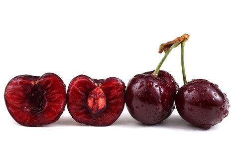 Cherries And Cherry Half Isolated On White Background Stock Photo