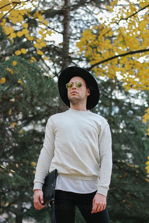 Male Model With Hat And Sunglasses In Park Del Colaborador De Stocksy Branislava Zivic Zrnic