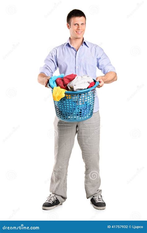 Man Holding A Basket Full Of Laundry Stock Photo Image Of Expression