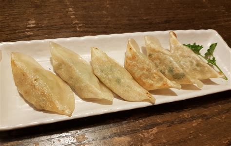 Pan Fried Veggie Gyoza (Spicy)