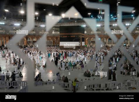 Muslim Pilgrims Walk Around The Kaaba During The Annual Hajj Pilgrimage