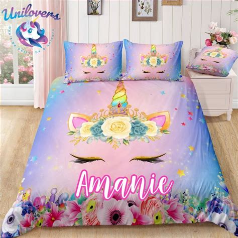 A Bed With Unicorns And Flowers On It