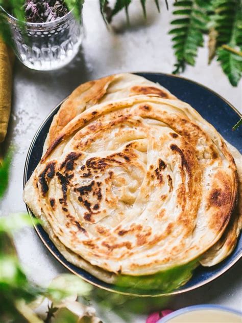 How To Make Flaky Roti Paratha Malaysian Roti Canai The Storied