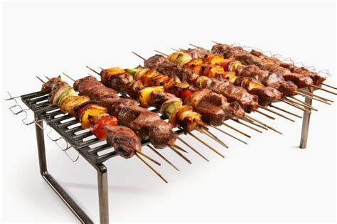 Premium Photo Sizzling Skewers A Grilled Gastronomic Delight On White