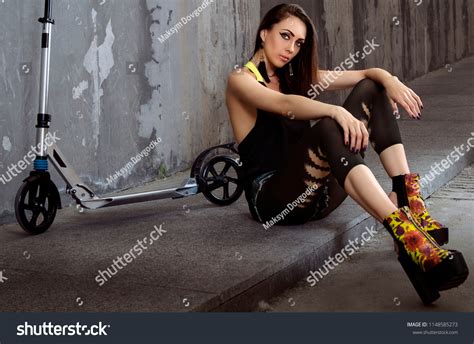 Beautiful Sexy Brunette Girl Sitting On Stock Photo 1148585273 Shutterstock
