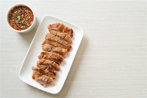 Grilled Pork Neck with Thai Spicy Sauce 2762497 Stock Photo at Vecteezy