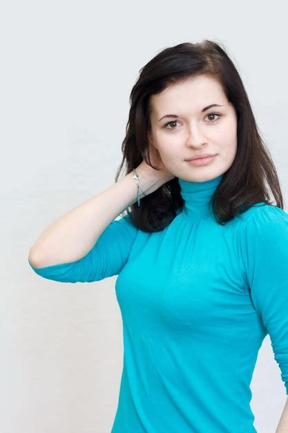 Premium Photo Beautiful Brunette Girl Smiling Cheerfully