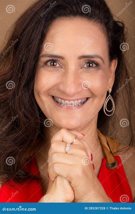 Mature Woman Very Happy Holding Both Hands Close To Her Face Passionate And Hopeful Person