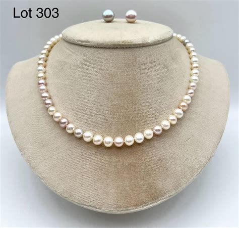 At Auction 14k Gold Freshwater Pearl Necklace And Earrings