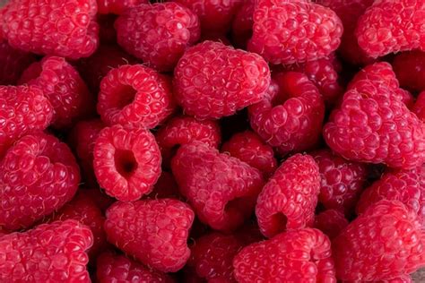 Premium Photo Sweet Fresh Organic Raspberries