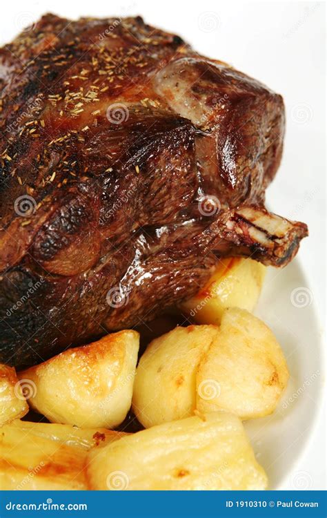 Roast lamb and potatoes stock photo. Image of restaurant - 1910310