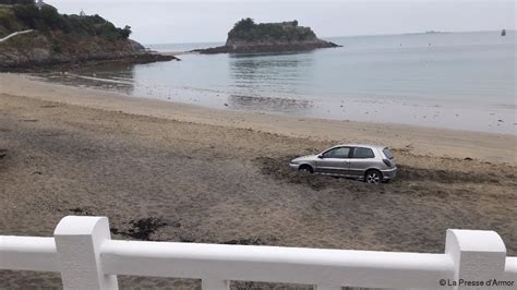 Une voiture embourbée sur la plage actu fr