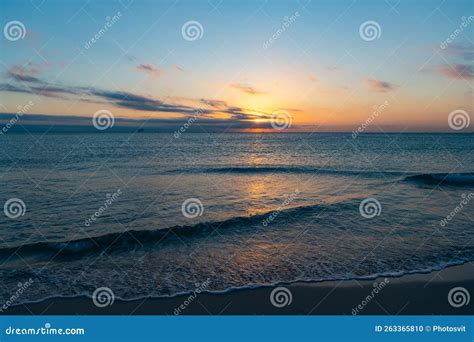 Beautiful Malibu Sunset With Sea Water On The Summer Beach Stock Photo