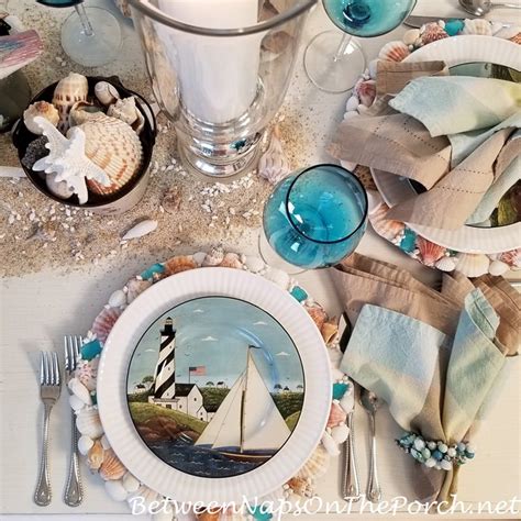 A Beach Nautical Themed Table Setting Shell Charger Plates Sailboat