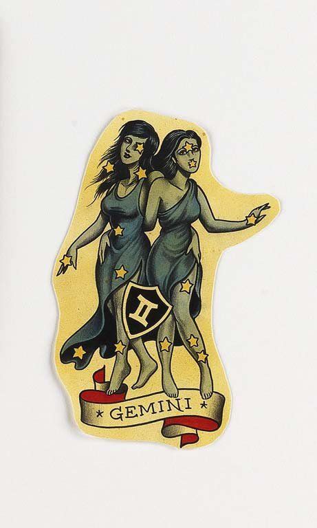 Two Stickers On The Side Of A Refrigerator With An Image Of Two Women