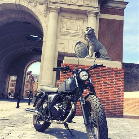 Retro Motorcycle With Lion Statue