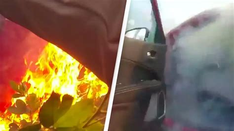 Moment Sheriff Rescues Woman Trapped In Burning Car Caught On Bodycam