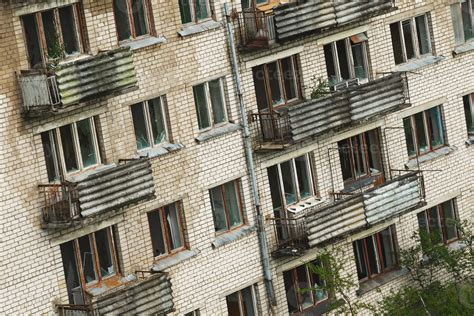 Exterior of abandoned apartment building in european ghost town