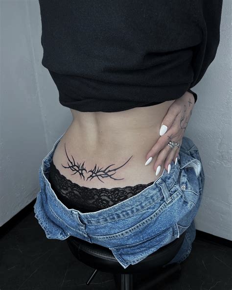 32 Tramp Stamp Tattoos That Will Turn Heads - Psycho Tats