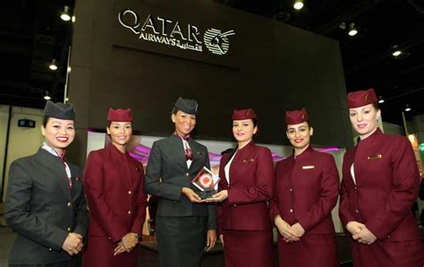 Qatar Airways Cabin Crew Proudly Showcase The Airline S Latest Award As