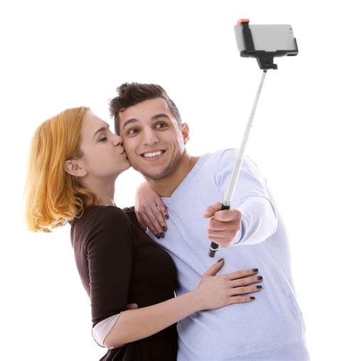 Pareja Joven Tomando Selfie Con Tel Fono M Vil Aislado En Blanco Foto