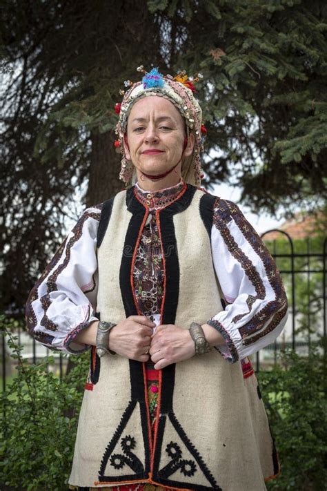 A Woman In Traditional Folk Costume At A Folklore Festival In Bulgaria