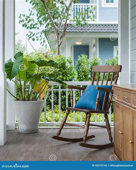 Wooden Rocking Chair On Front Porch With Pillow Stock Photo Image Of