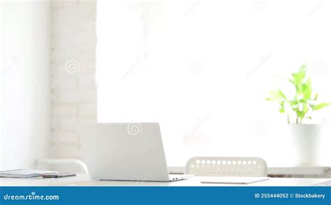 Empty Office with Open Laptop on Desk Stock Photo - Image of white ...