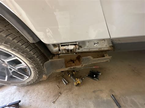 Gear tunnel door squeak lube point : r/Rivian