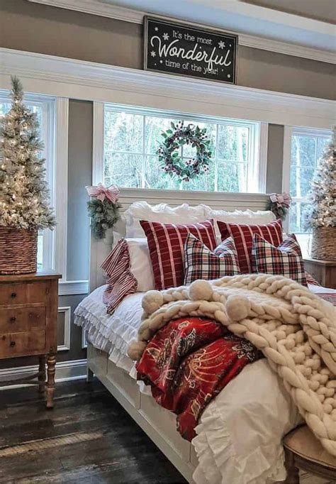 A Bedroom Decorated For Christmas With Red And White Decorations On The