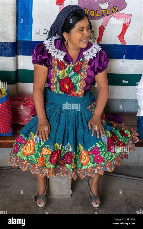 An Indigenous Zapotec Woman In Traditional Dress In Tlacolula De