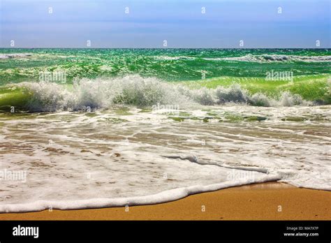 Sandy Beach And Waves Azure Water Stock Photo Alamy