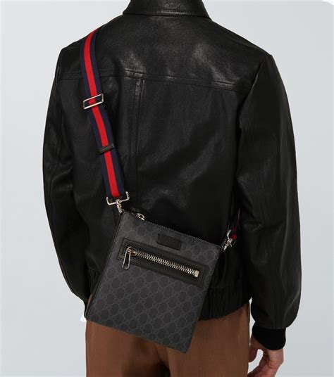 Gg Supreme Messenger Bag In Black Gucci Mytheresa