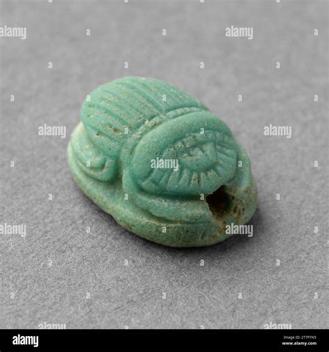 Ancient egyptian faience scarab amulet Stock Photo - Alamy