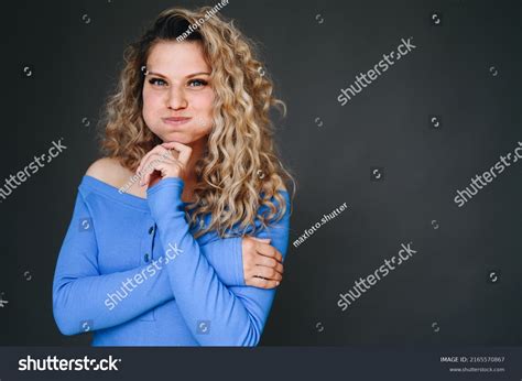 Curly Blonde Girl Blows Her Cheeks Stock Photo Shutterstock