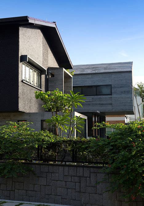 House Extension By Formwerkz Architects With Cantilevered Concrete Box