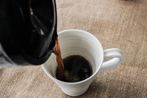 Free Stock Photo Of Coffee Pouring Into Mug From Pot