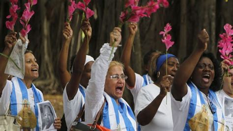 Members of the Cuban dissident group Ladies in White participate in a demonstration in Havana ...