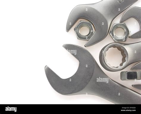 wrench and nut tool on white background Stock Photo - Alamy