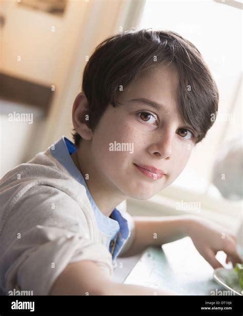 Boy with brown hair and eyes hi-res stock photography and images - Alamy