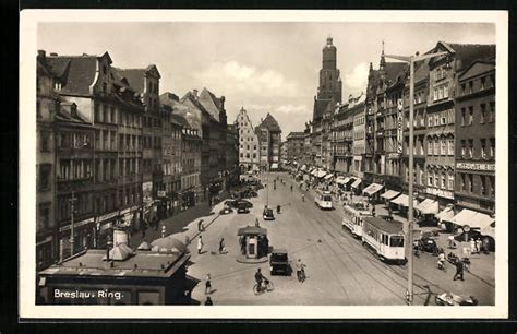 AK Breslau Strasse Ring mit Geschäften und Strassenbahn 11691619