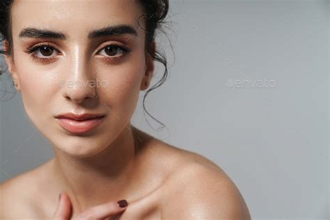 Image Of Beautiful Half Naked Woman Posing And Looking At Camera Stock